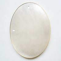 Brass oval mirror