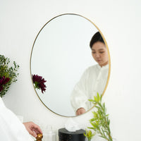 Brass oval mirror
