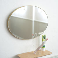 Brass oval mirror