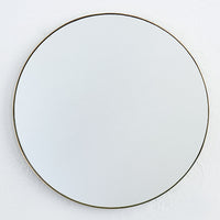 Brass round mirror 600