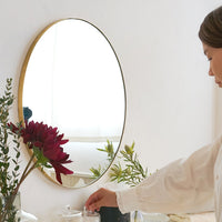 Brass round mirror 600
