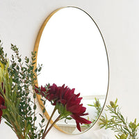 Brass round mirror 600