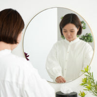 Brass round mirror 600